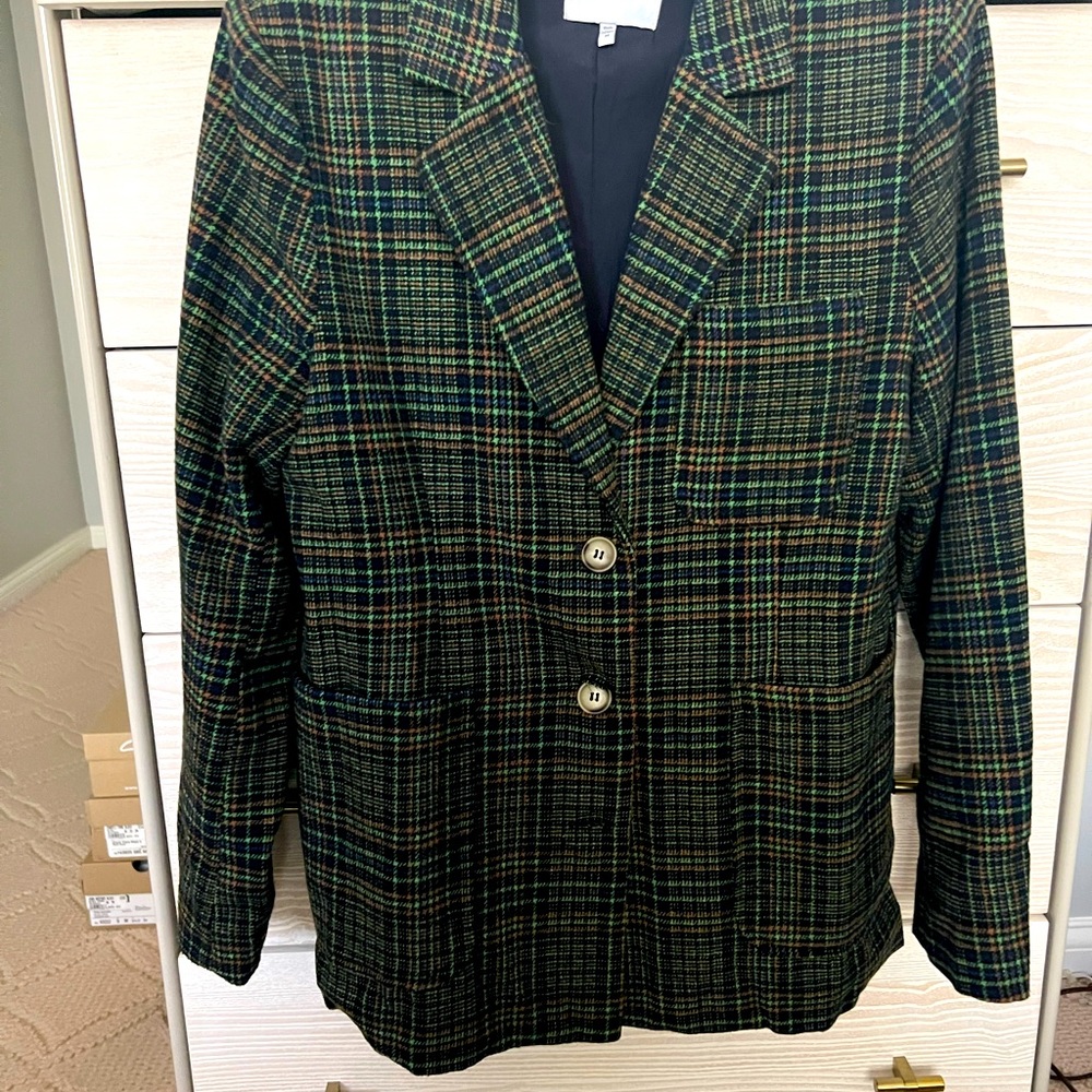 Plaid women’s blazer in navy, rust , grey blue tones. Navy blue lining